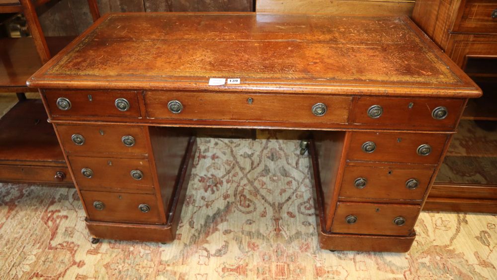 A Victorian mahogany pedestal desk, with leather inset top on plinth base, W.120cm, D.58cm, H.70cm